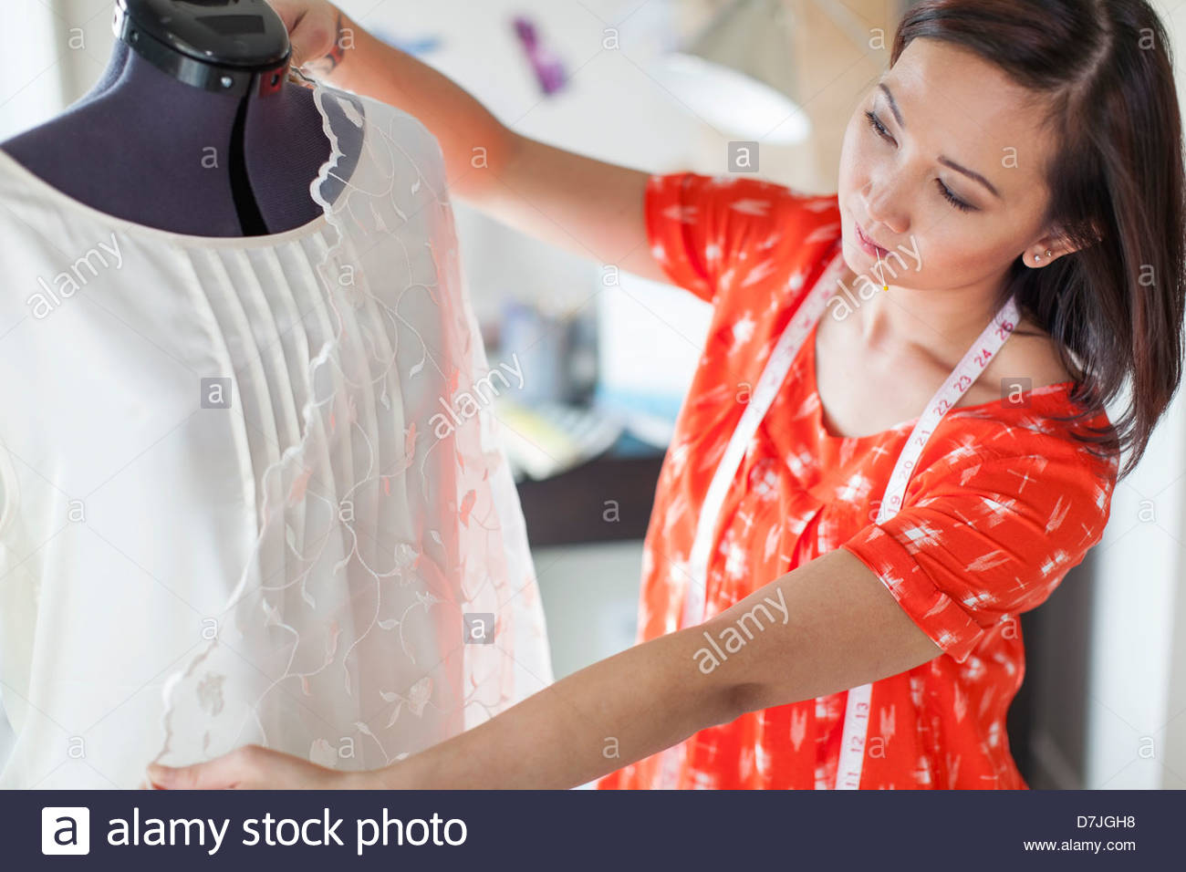 Female seamstress working in home studio Stock Photo Alamy