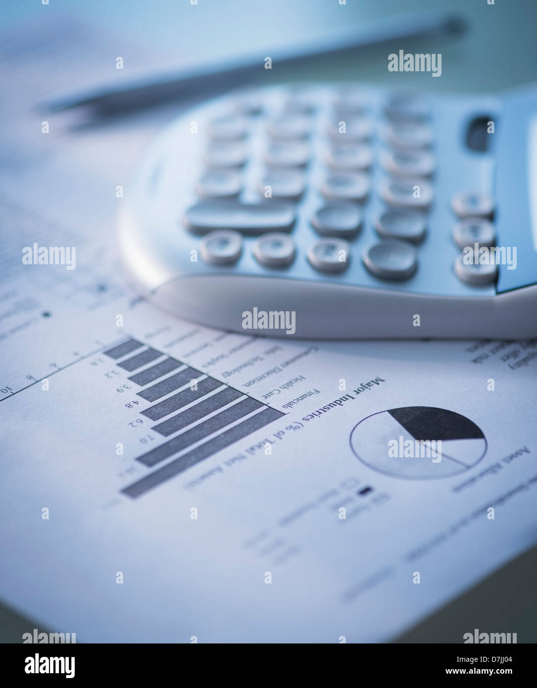 Studio Shot of calculator and paper material Stock Photo