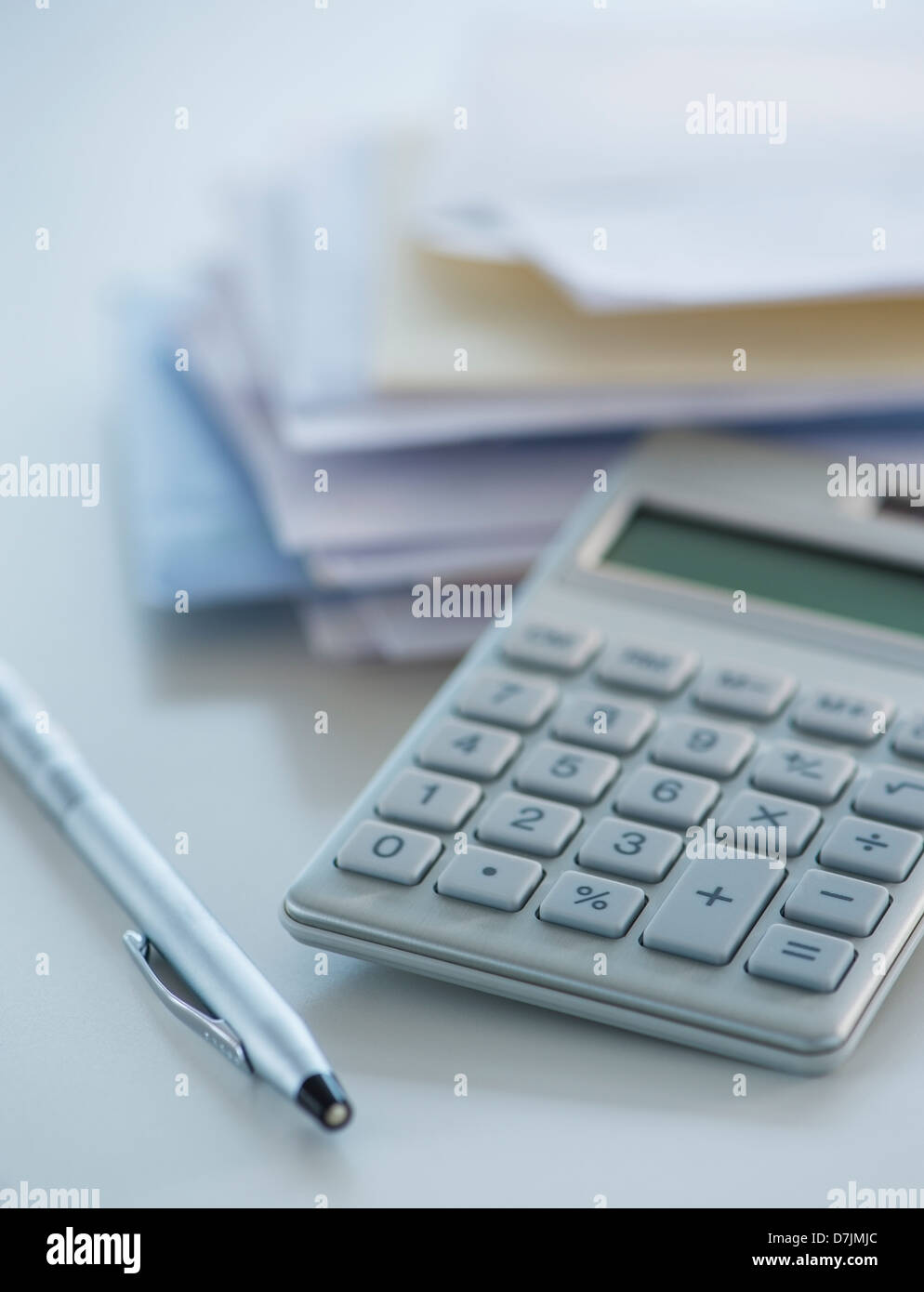 Studio Shot of calculator, pen and paper material Stock Photo Alamy
