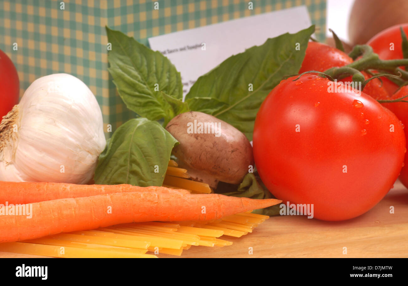 Recipe box and the ingredients for fresh spaghetti and sauce Stock Photo