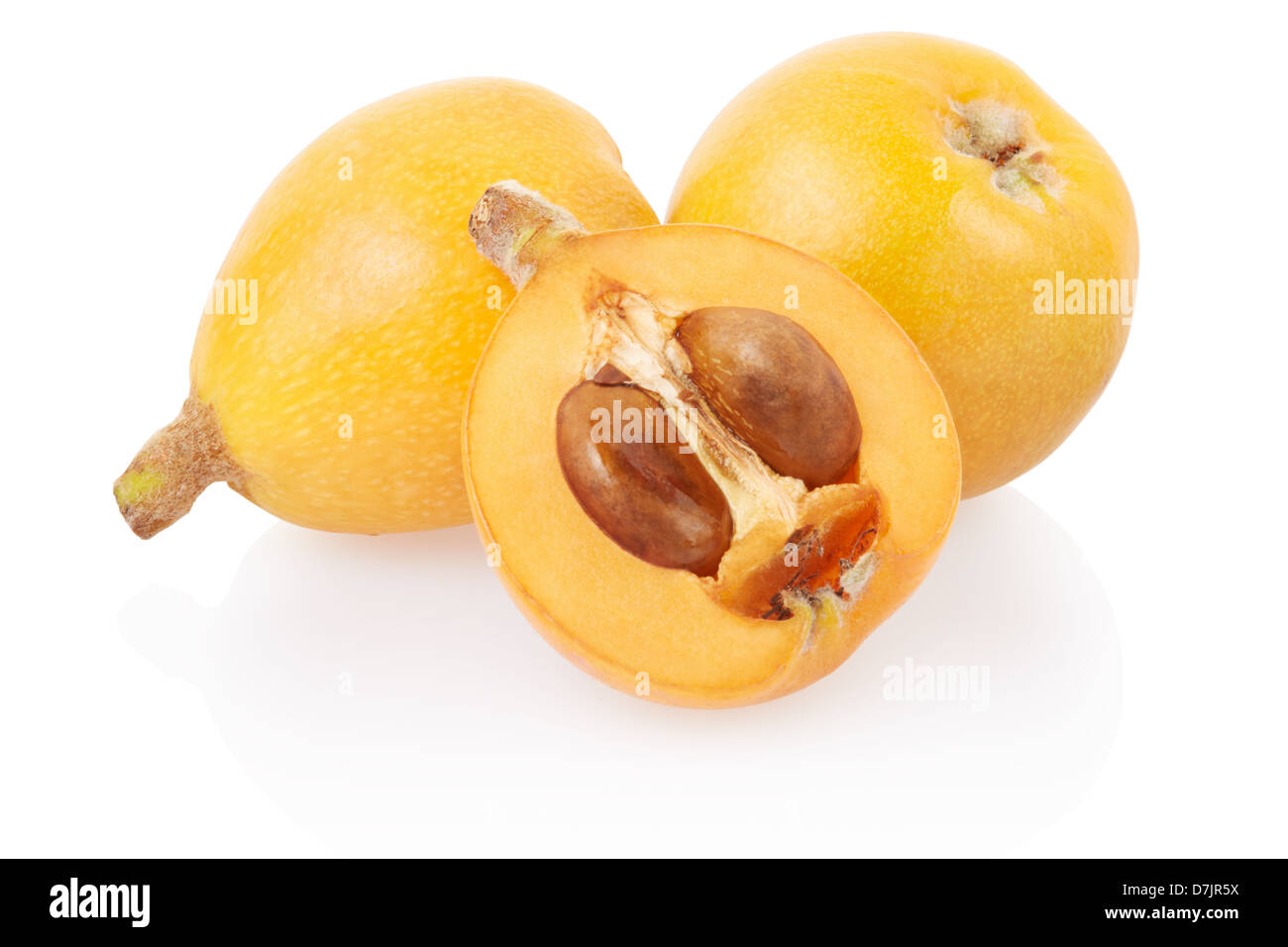 Loquat fruit and half Stock Photo