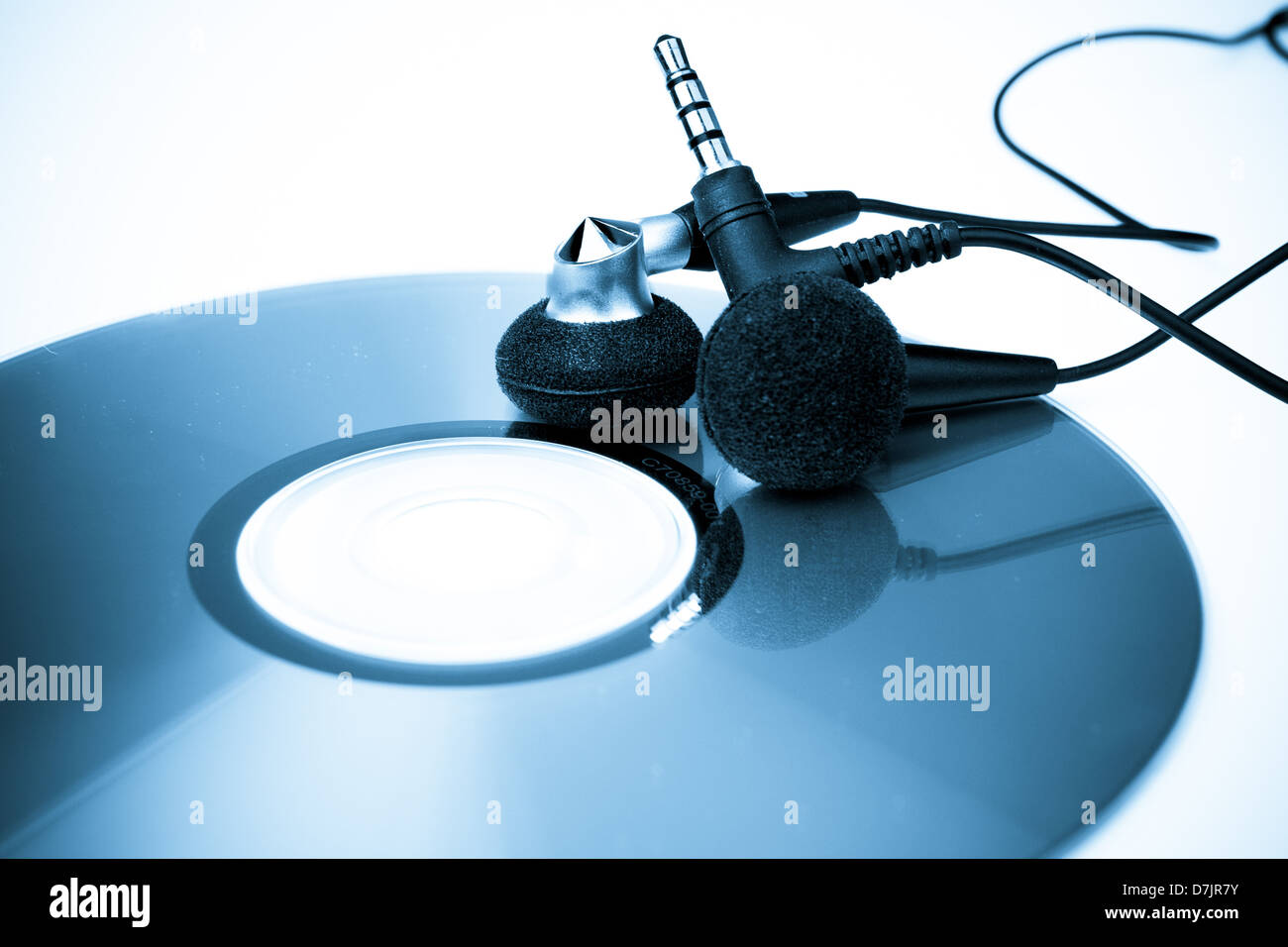 Audio headphones with CD blue tone Stock Photo
