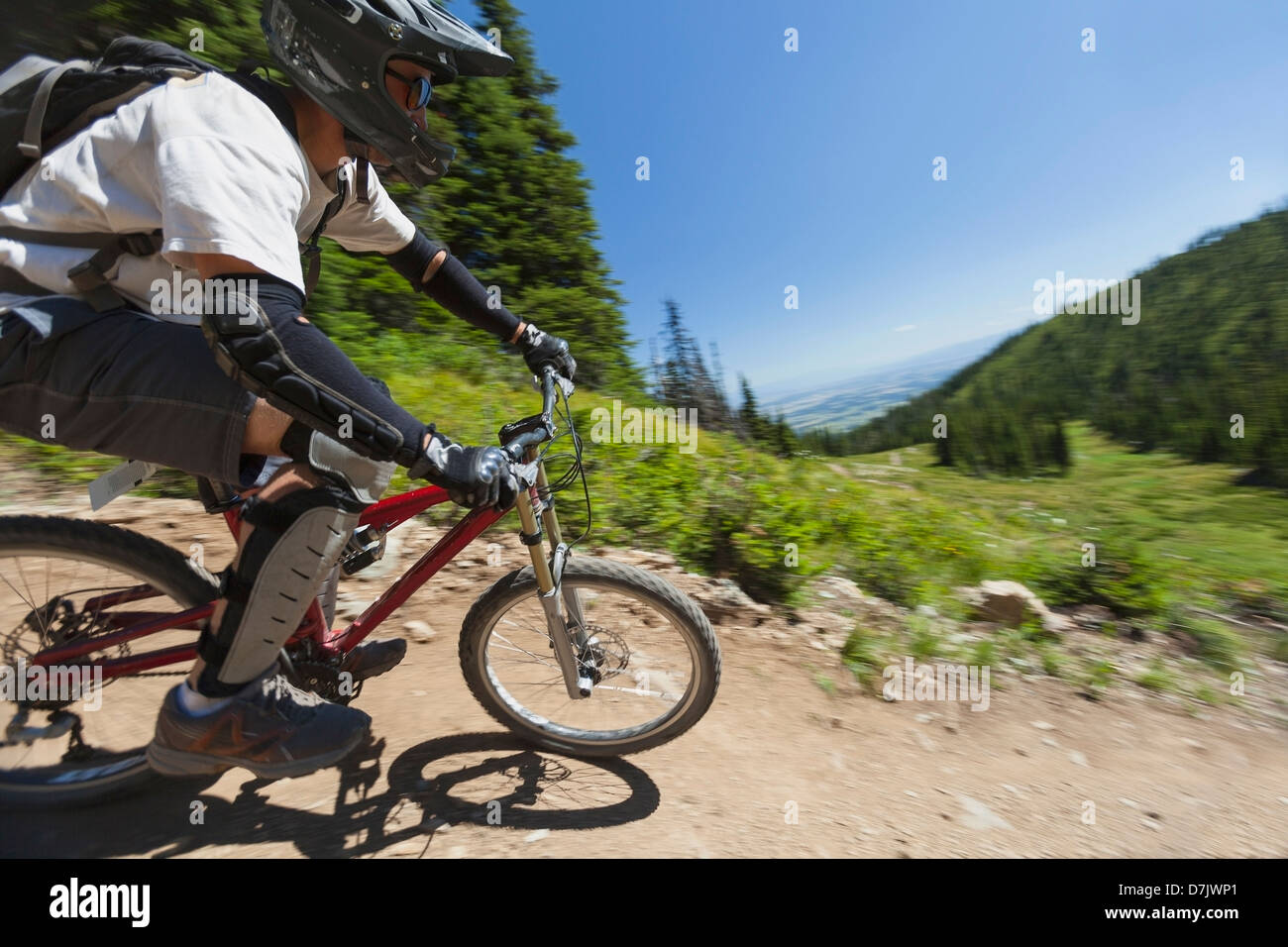 USA, Montana, Whitefish, Man mountain biking Stock Photo