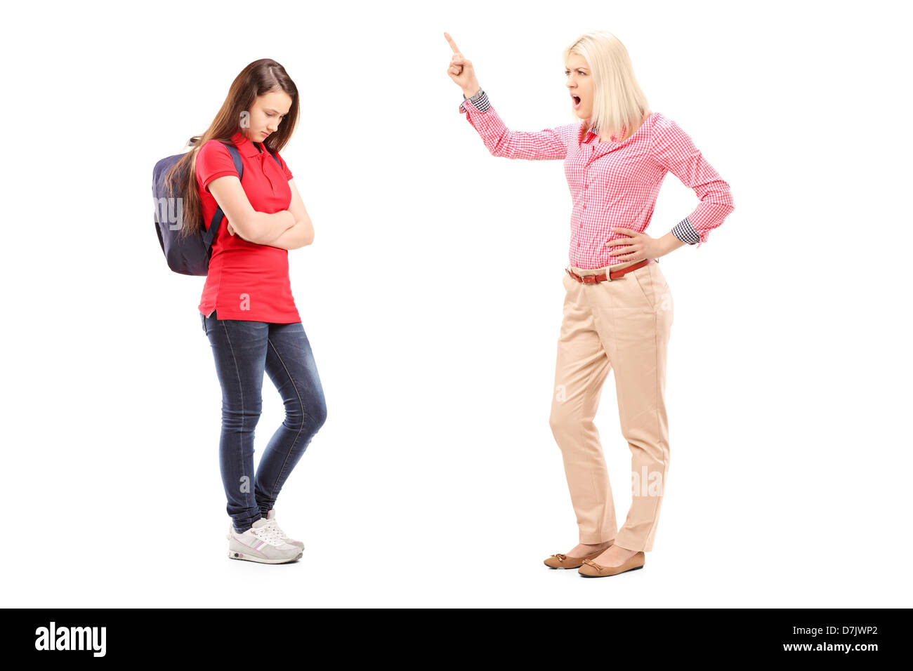 Full length portrait of an angry mother shouting at her daughter isolated  on white background Stock Photo - Alamy