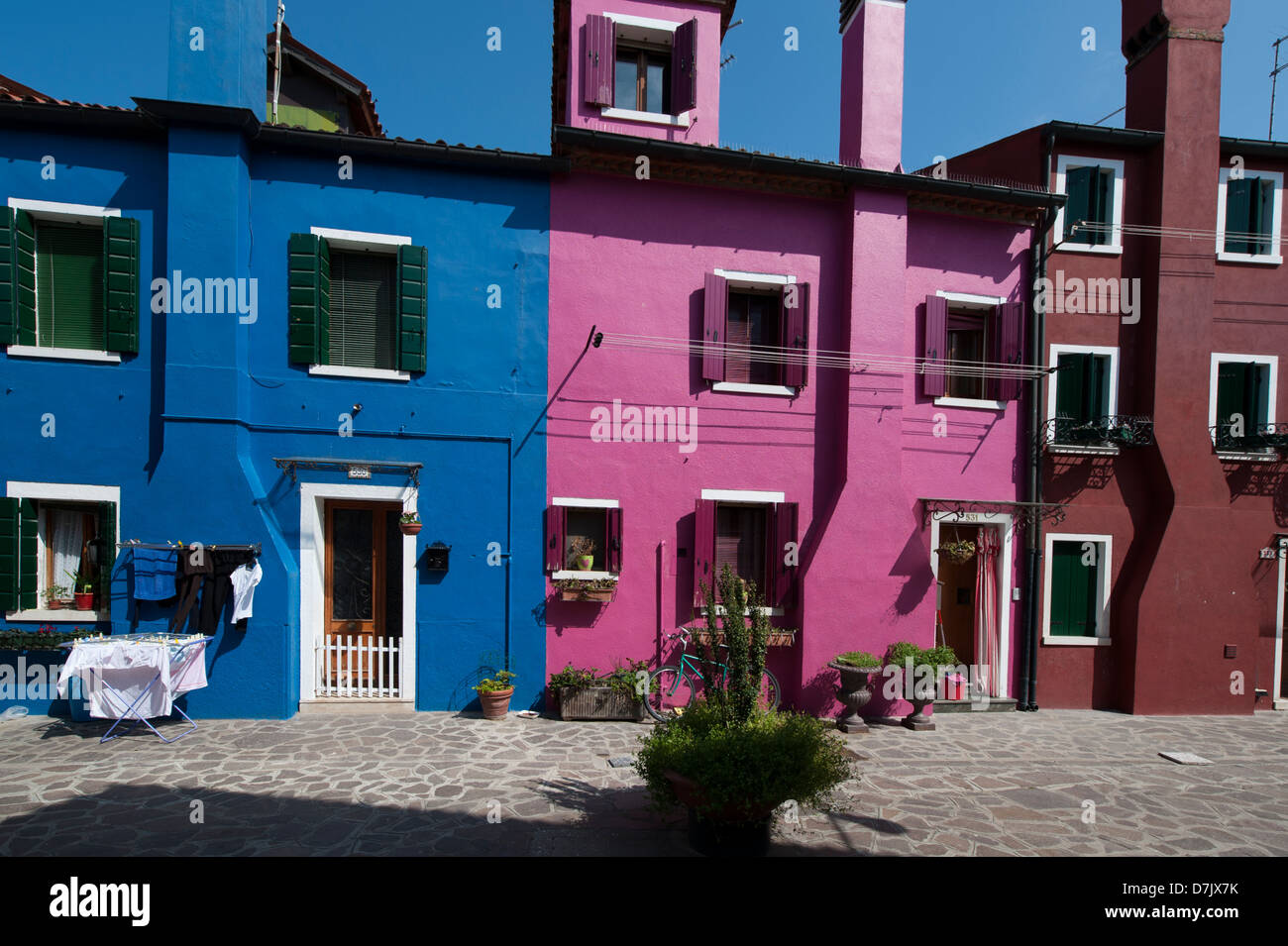 Brightly coloured houses Burano island off Venice, Veneto, Italy. 2013 Stock Photo