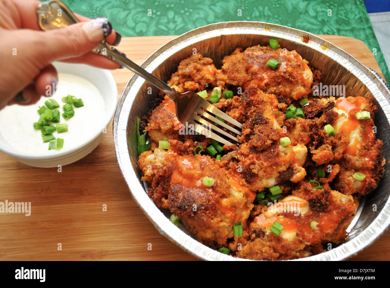 Eating Take Out Hot Wings Stock Photo Alamy