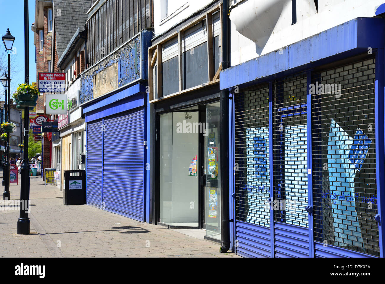 Row of closed down shops, High Street, Staines-upon-Thames, Surrey, England, United Kingdom Stock Photo