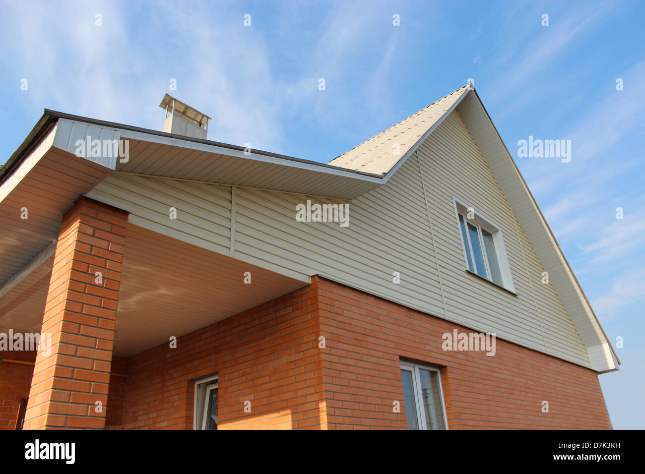 new private modern house on the blue sky background Stock Photo