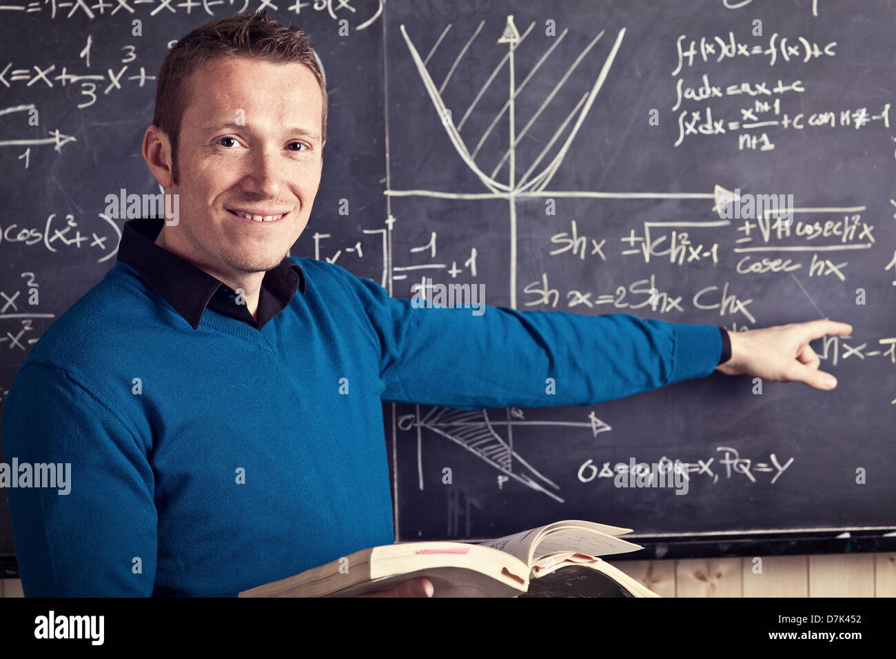 portrait of caucasian teacher and blackboard Stock Photo