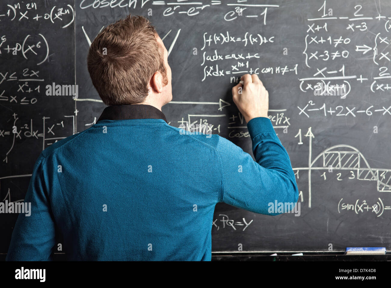 portrait of caucasian teacher and blackboard Stock Photo