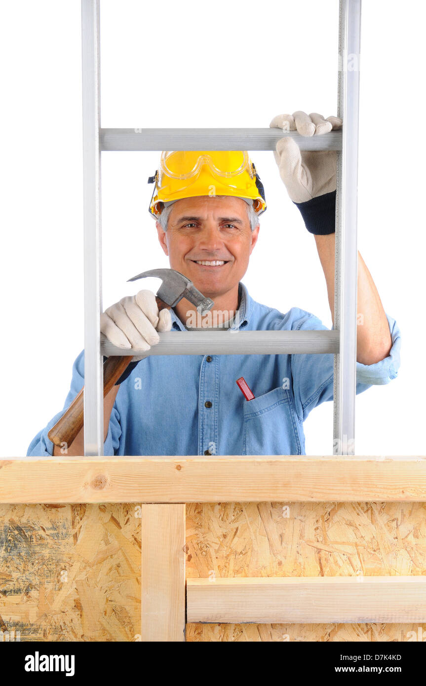 Closeup of a carpenter climbing a ladder isolated over white. Stock Photo