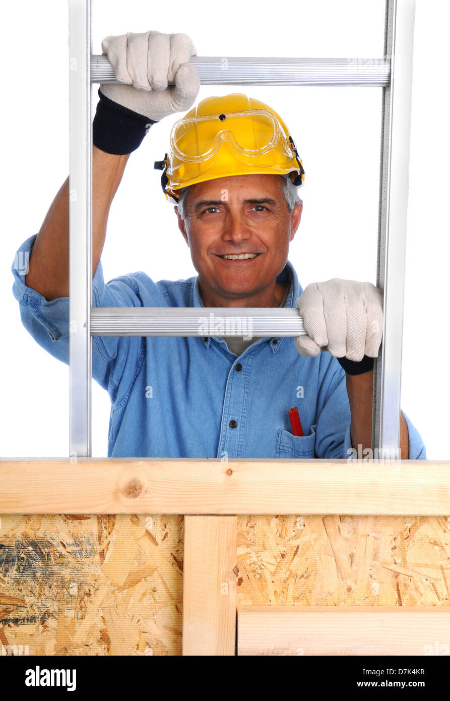 Closeup of a construction worker climbing a ladder isolated over white. Stock Photo