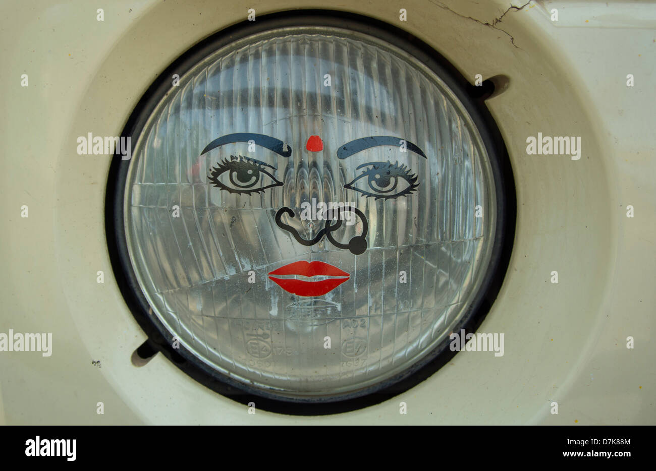 India, Bangalore, Face on cars head light, close up Stock Photo Alamy
