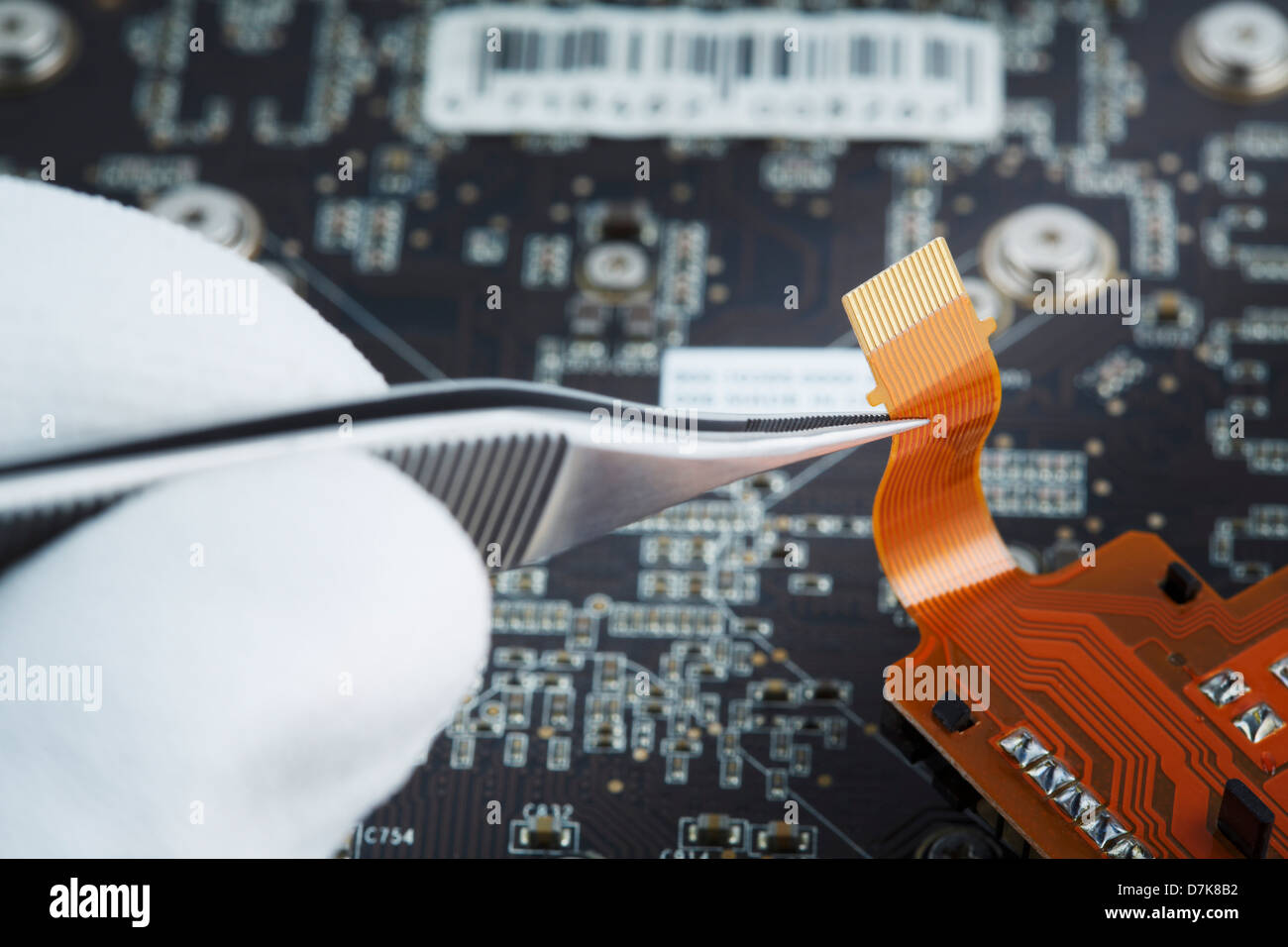 Human hand repairing printed circuit board, close up Stock Photo Alamy