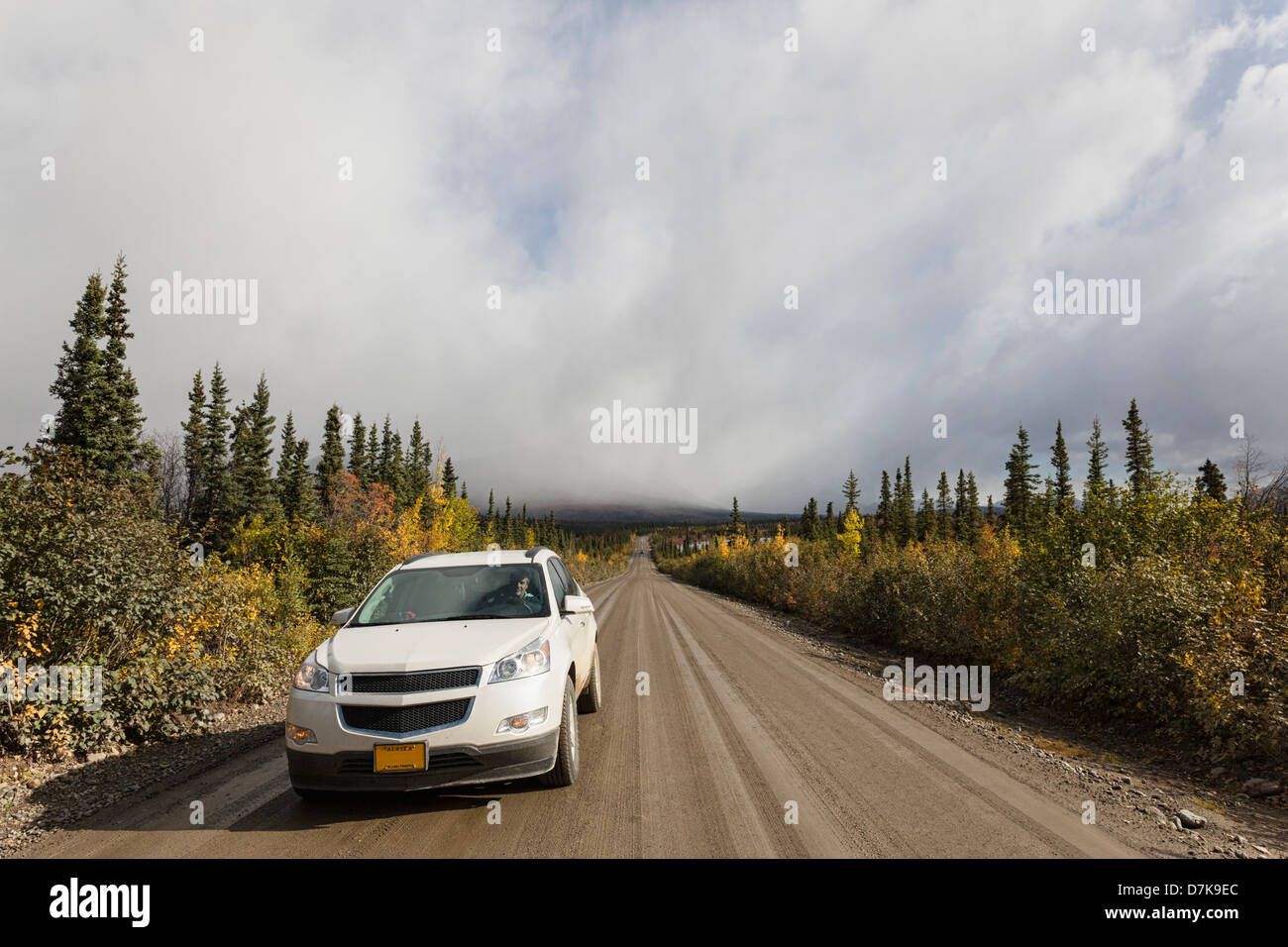 USA, Alaska, Car moving through Denali Highway in autumn Stock Photo