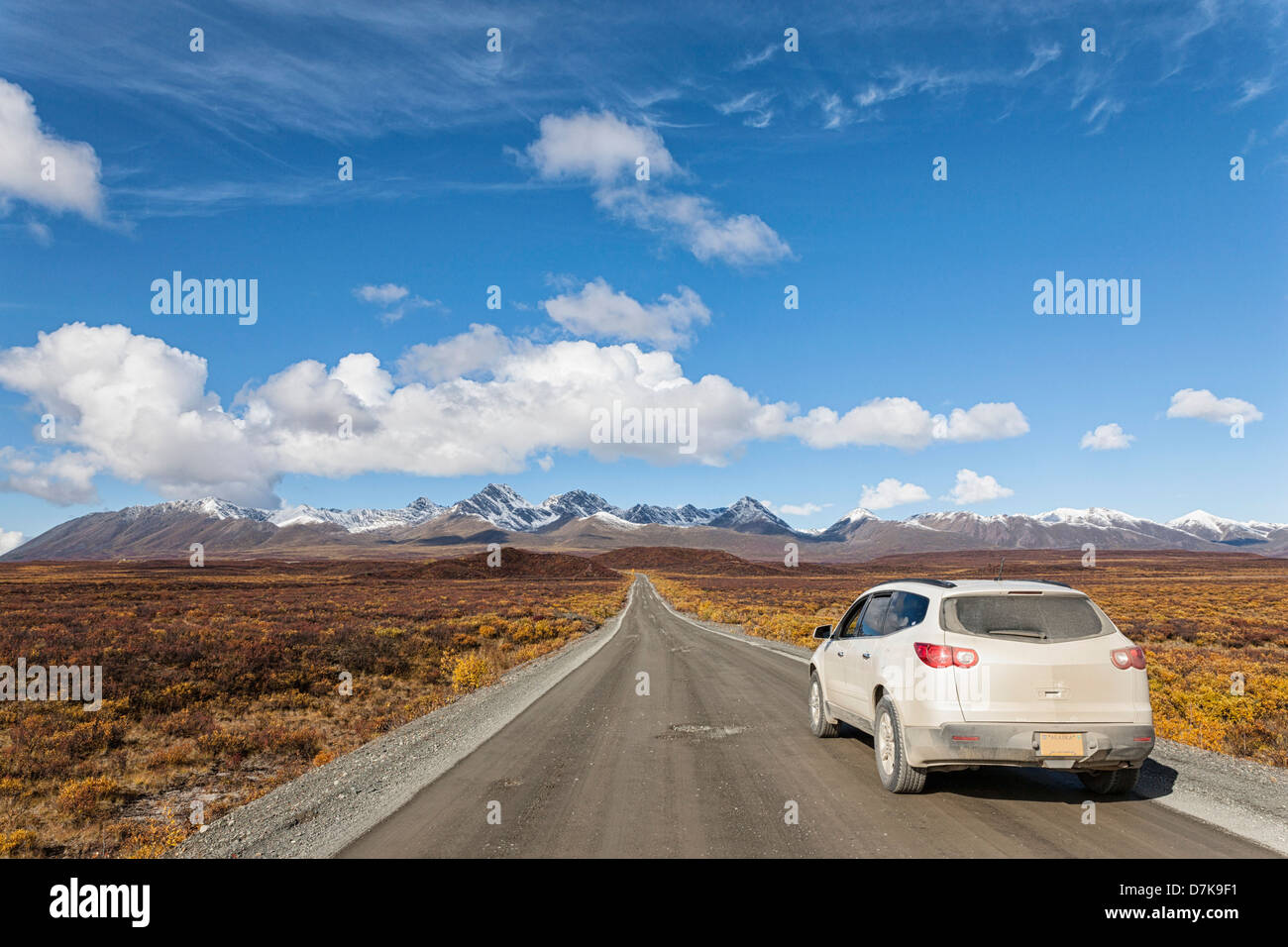 USA, Alaska, Car moving through Denali Highway in autumn Stock Photo