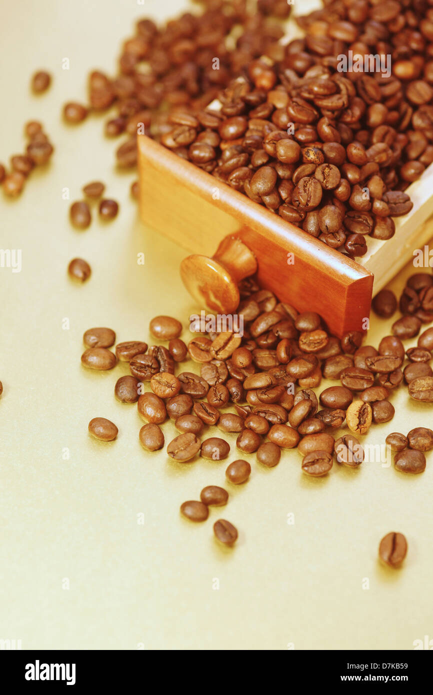 Germany, Wood drawer full of coffeebeans, close up Stock Photo