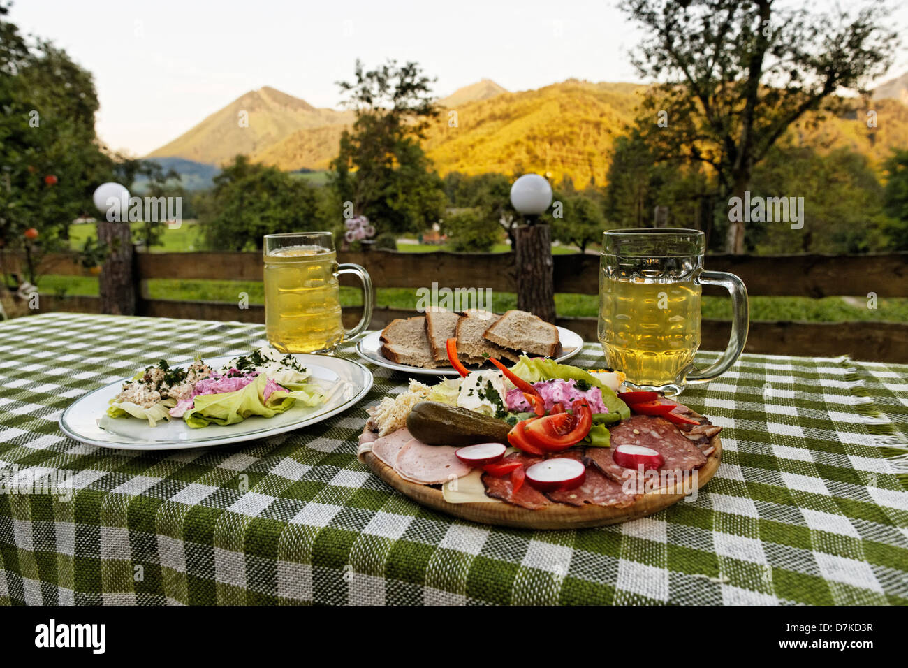 Austria, Upper Austria, Glasses of cider with lunch Stock Photo