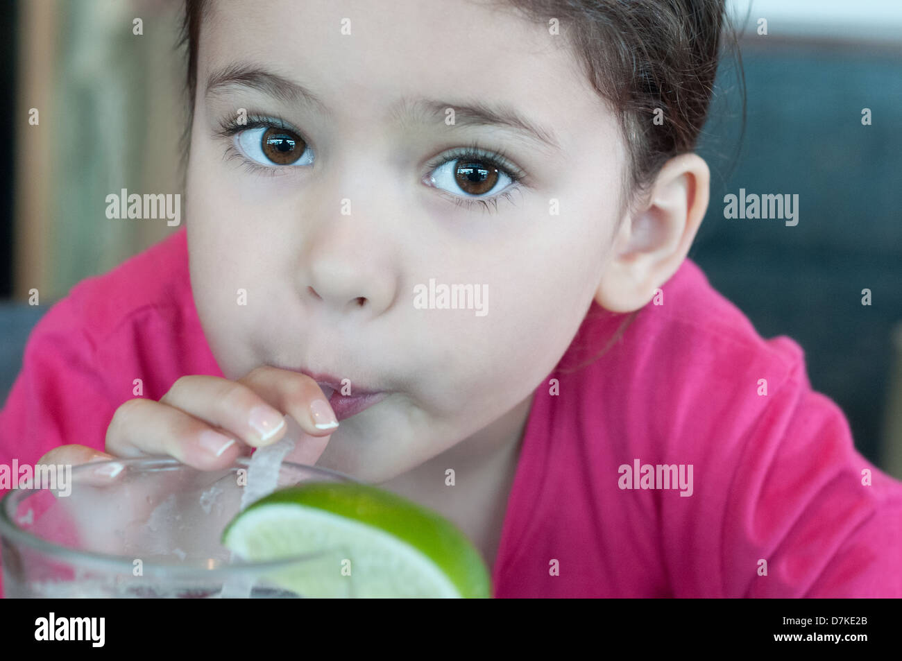 Girl drinking lemonade Stock Photo Alamy