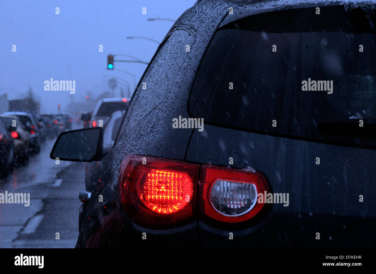 Traffic is stopped as a winter storm drops snow on Speedway Boulevard, Tucson, Arizona, USA. Stock Photo