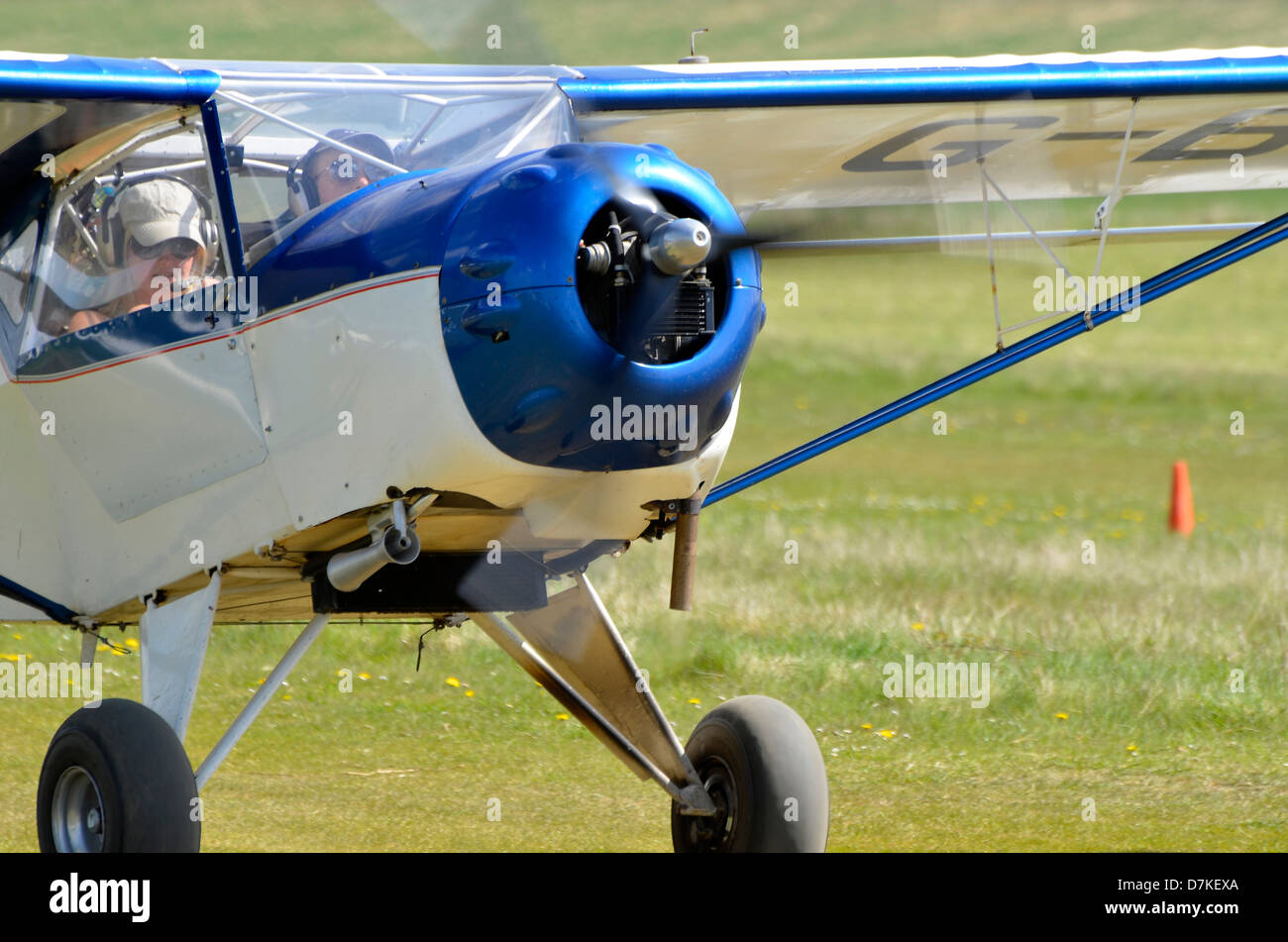 Kitfox IV kit built light plane just landed on a grass airstrip Stock Photo