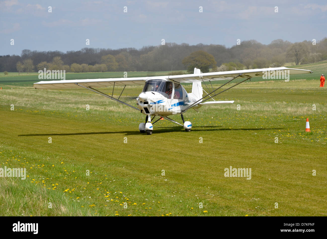 Ikarus C42 microlight aircraft registration G-CDRO taxiing after landing at Popham Airfield, Hampshire. Stock Photo