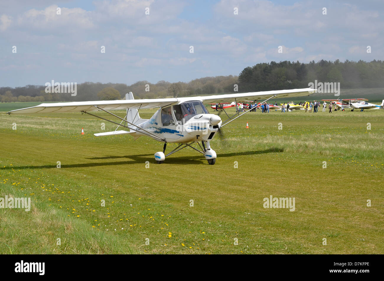 Ikarus C42 microlight aircraft registration G-CDRO taxiing after landing at Popham Airfield, Hampshire. Stock Photo