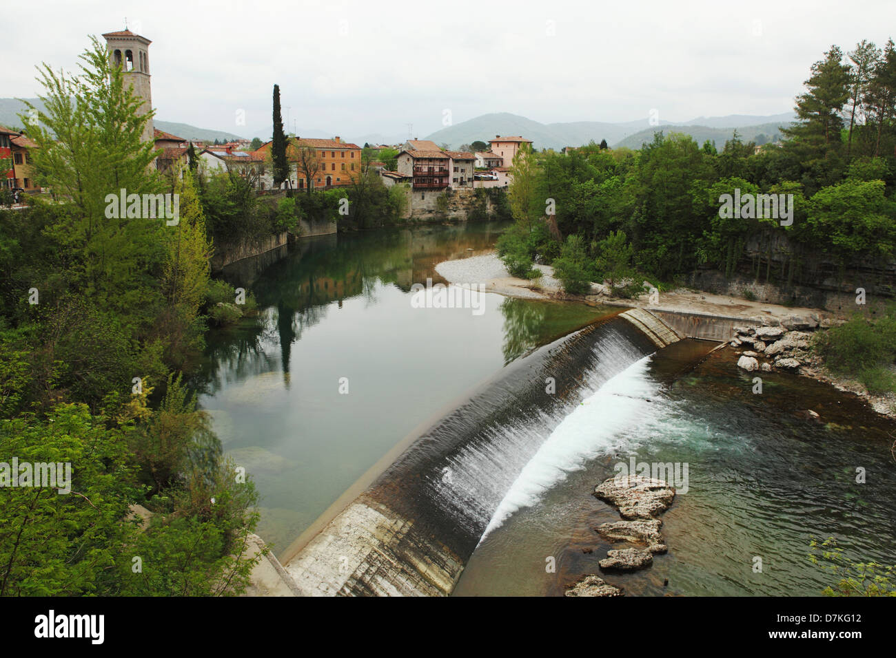 Natisone River flows past the Lombard Oratoria di Santa Maria in Valle in Cividale del Friuli, Italy. Stock Photo