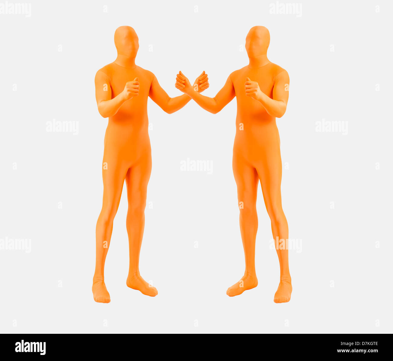 Men in orange zentai gesturing as holding Stock Photo