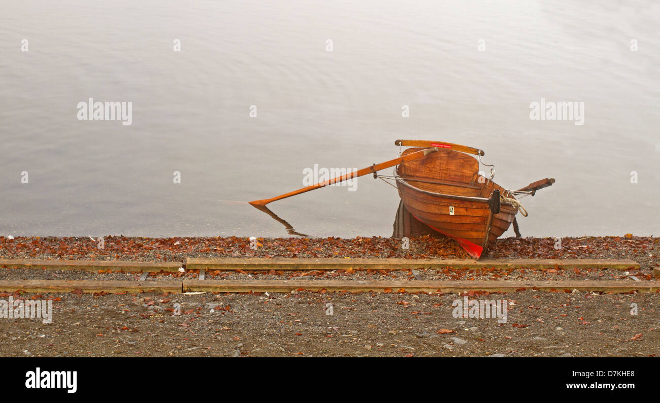 Lone fisherman rowing boat hi res stock photography and images Alamy