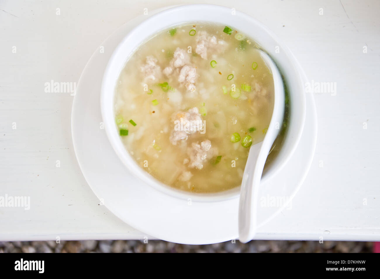 boil rice with pork for meal Stock Photo