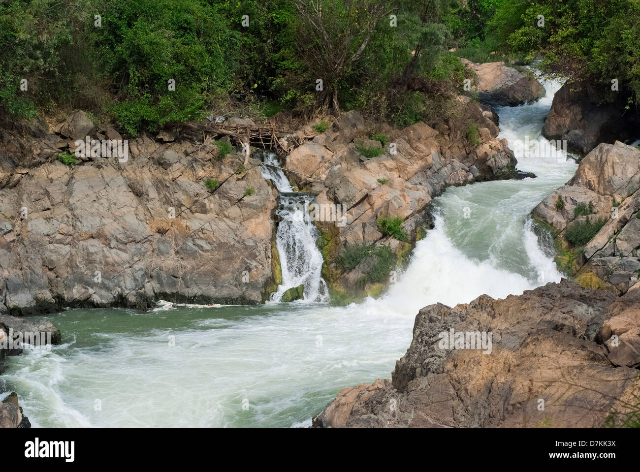 Curving stream of Tat Somphamit Falls Stock Photo