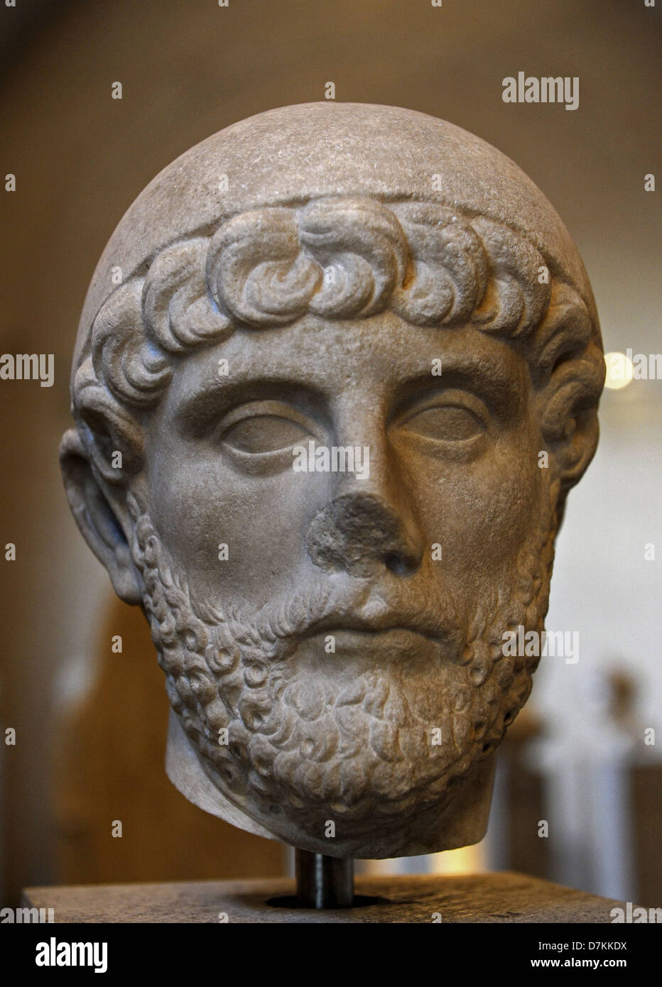 Roman art. Imperial era. Head of a man with a Priest's cap. About 120 AD. Stock Photo