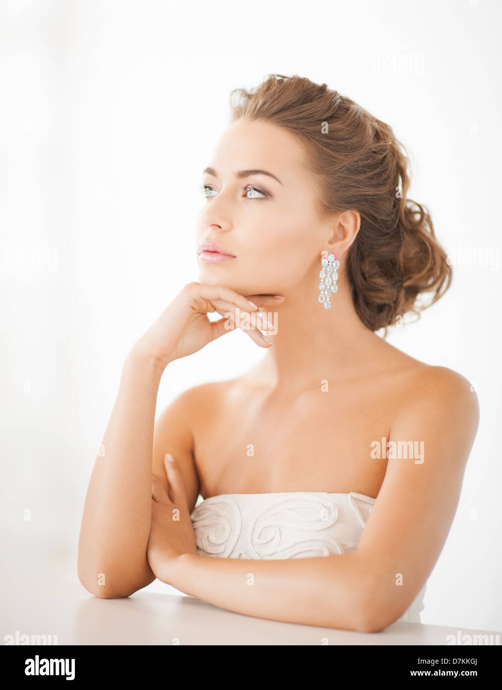 Wearing long earrings hi-res stock photography and images - Alamy