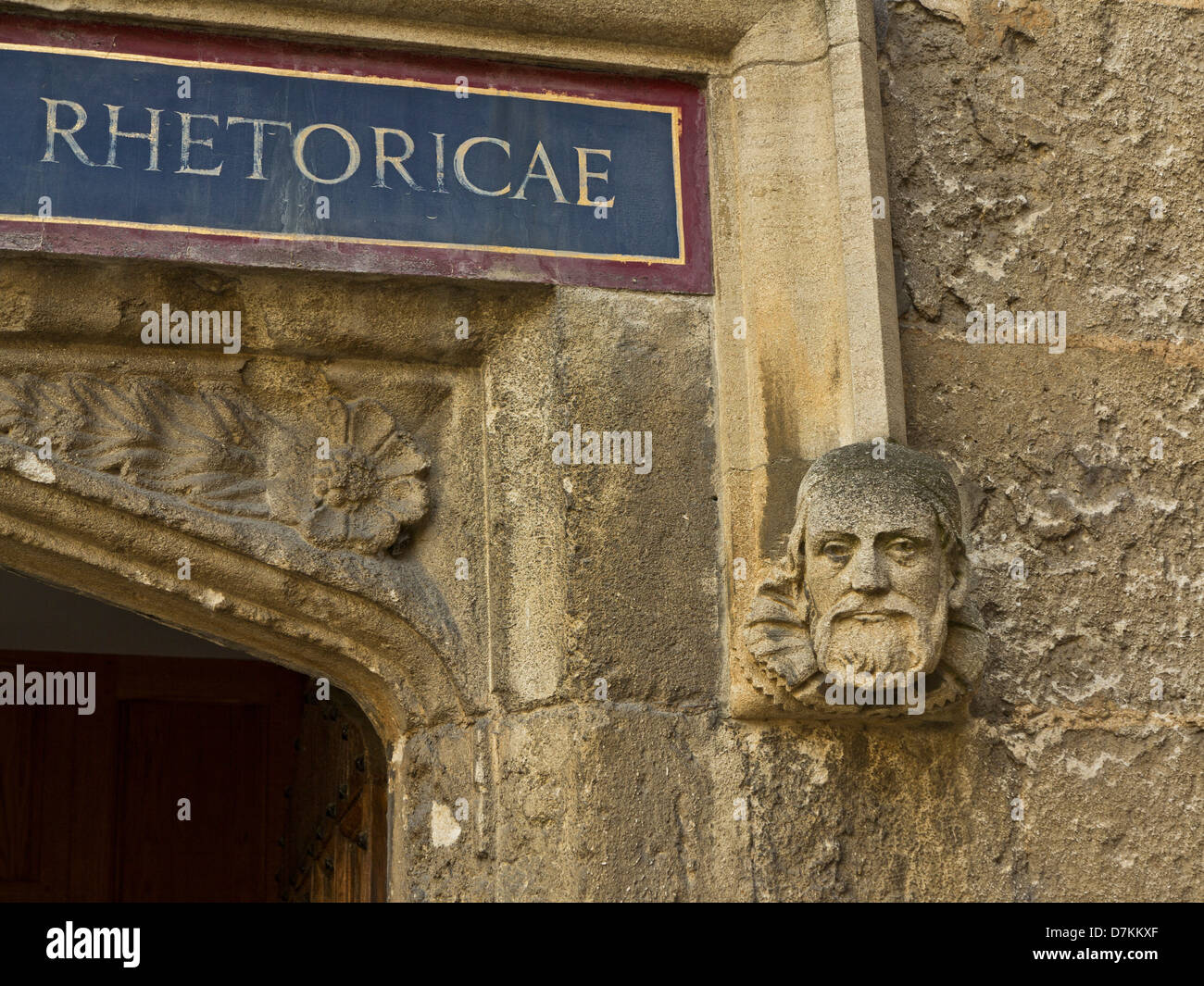 Gargoyle and sign in latin at the Bodleian library in Oxford, England
