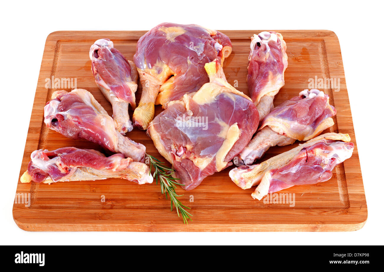 duck meat on a cutting board in front of white background Stock Photo
