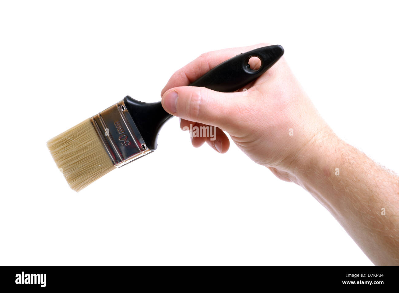 Hand painting with brush onto isolated copy space. Stock Photo