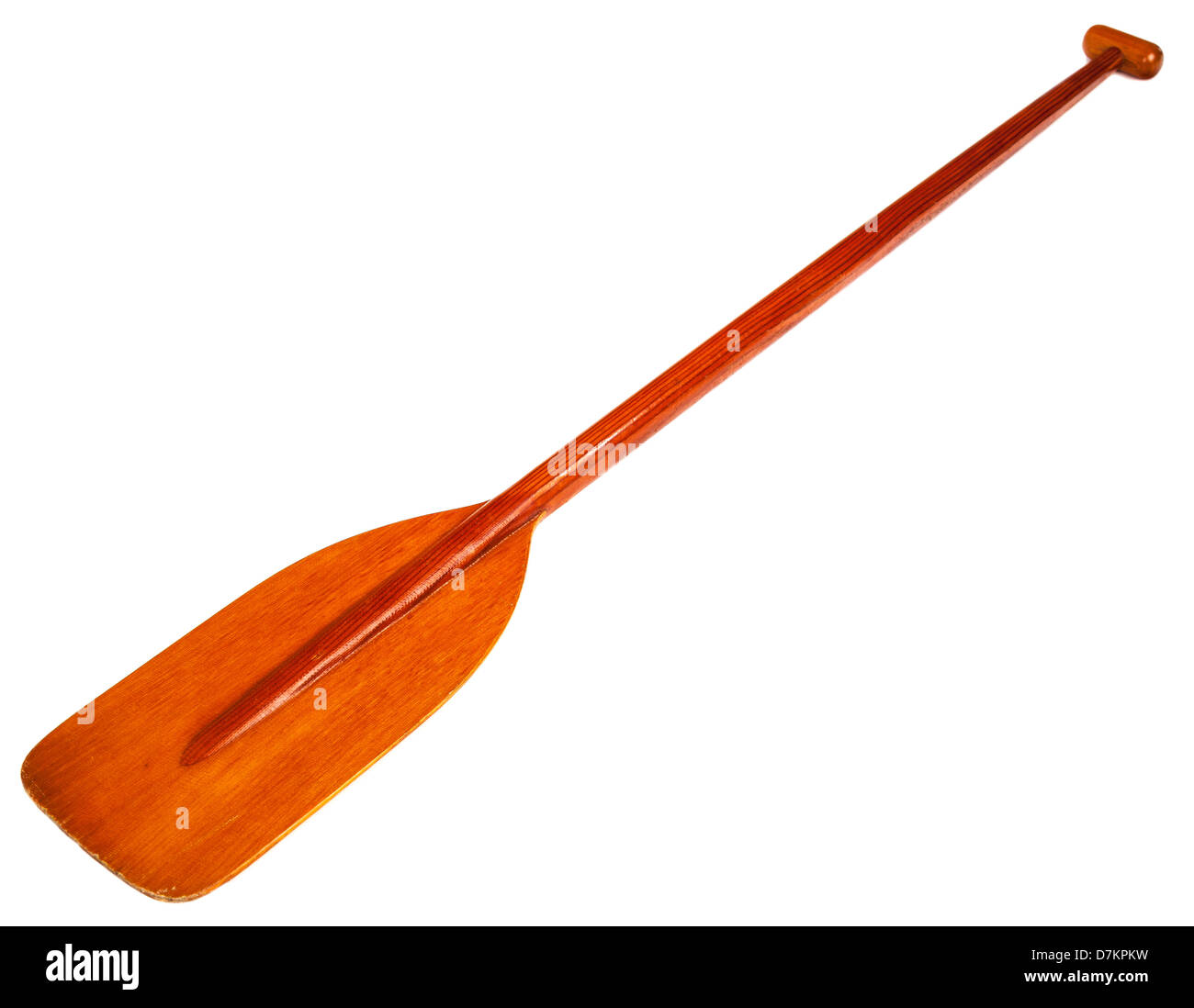 old wooden canoe paddle with a blade reinforced by fiberglass Stock Photo