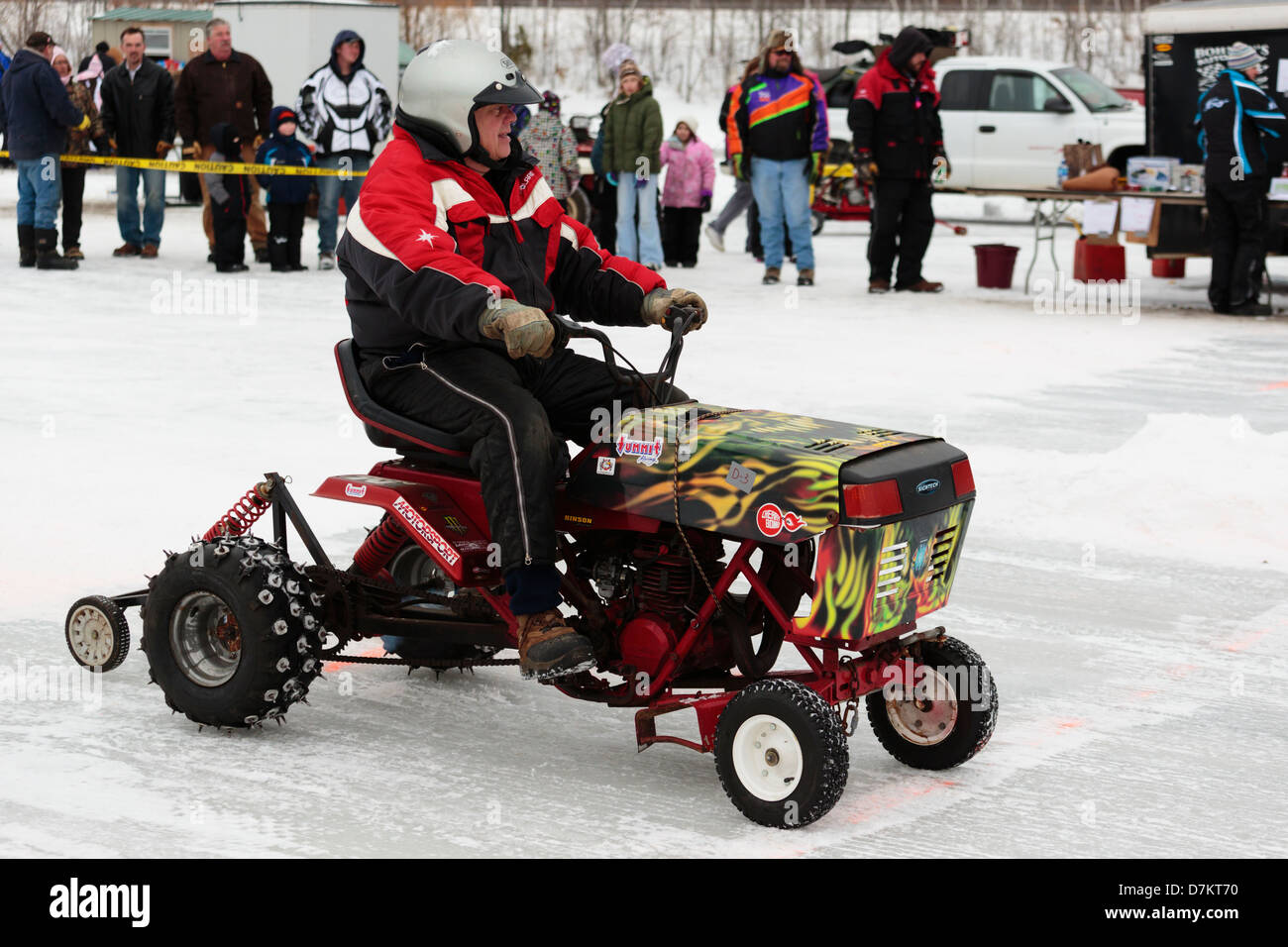 A man waits at the starting line for a heat during the first annual lawn mower ice races on Knife Lake - Minnesota, USA. Stock Photo
