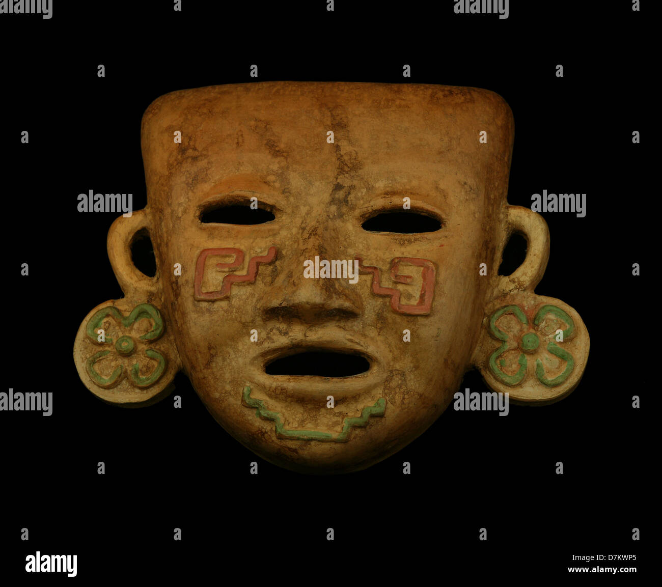 Mayan mask on a black background Stock Photo