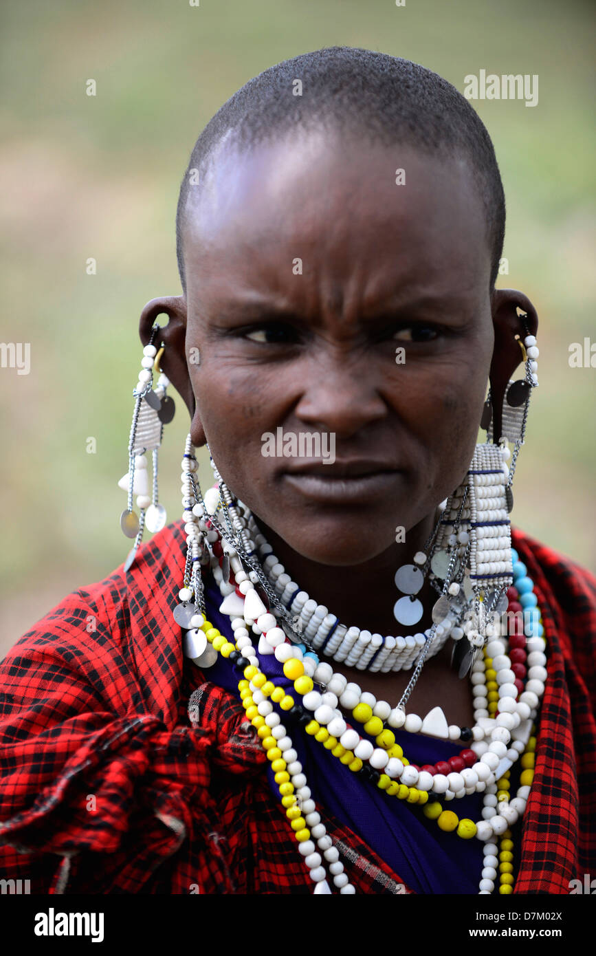 A Masai woman wearing  traditional earrings. Stock Photo