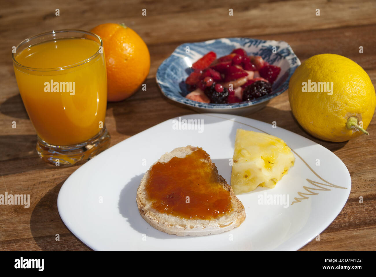 Italian breakfast with fresh fruit and marmalade Stock Photo