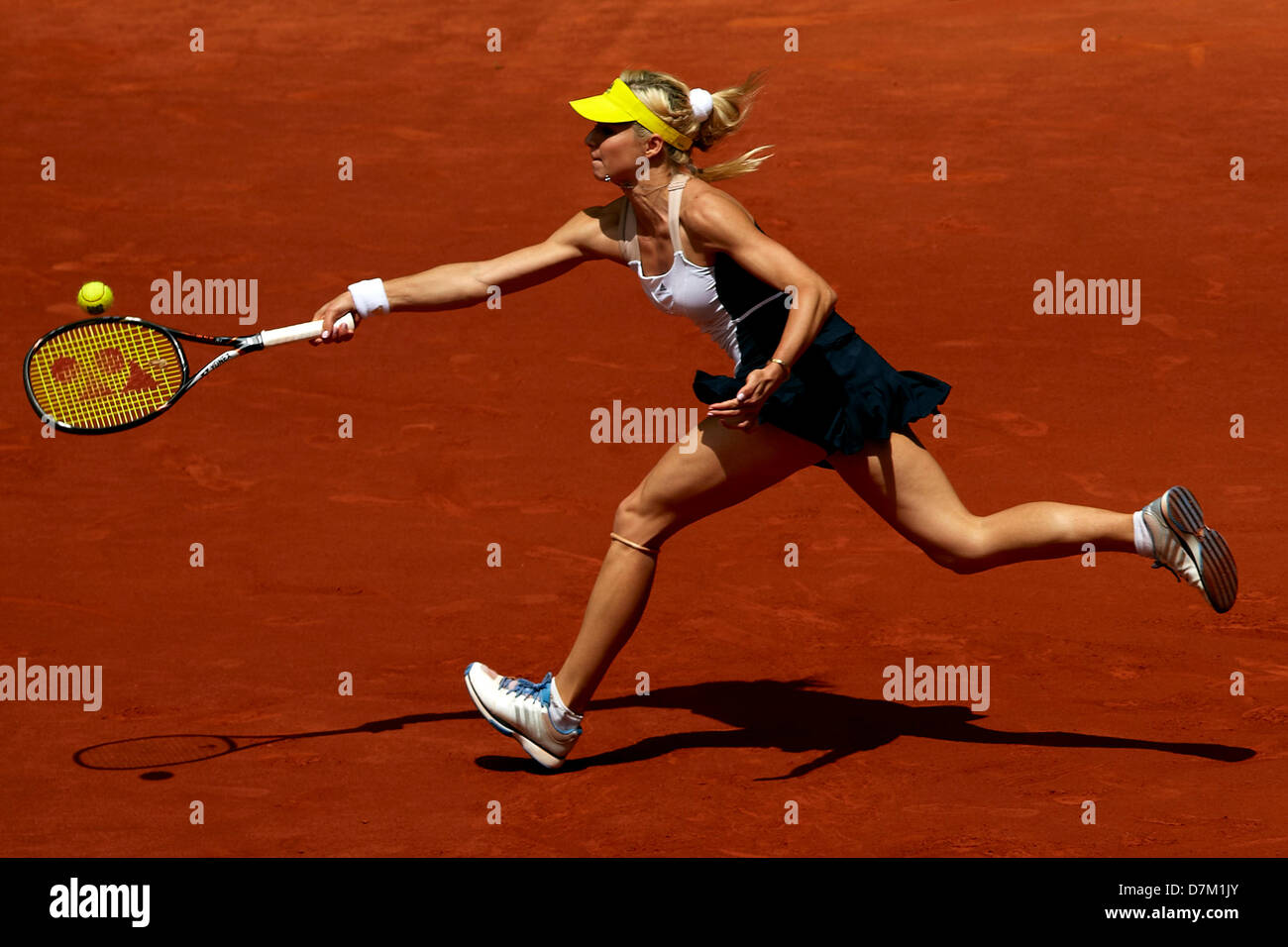 Madrid, Spain. 9th May 2013. Maria Kirilenko of Russia stretches to play a forehand during the game between Serena Williams of USA and Maria Kirilenko of Russia during day seven of the Madrid Open from La Caja Magica. Credit: Action Plus Sports Images/Alamy Live News Stock Photo