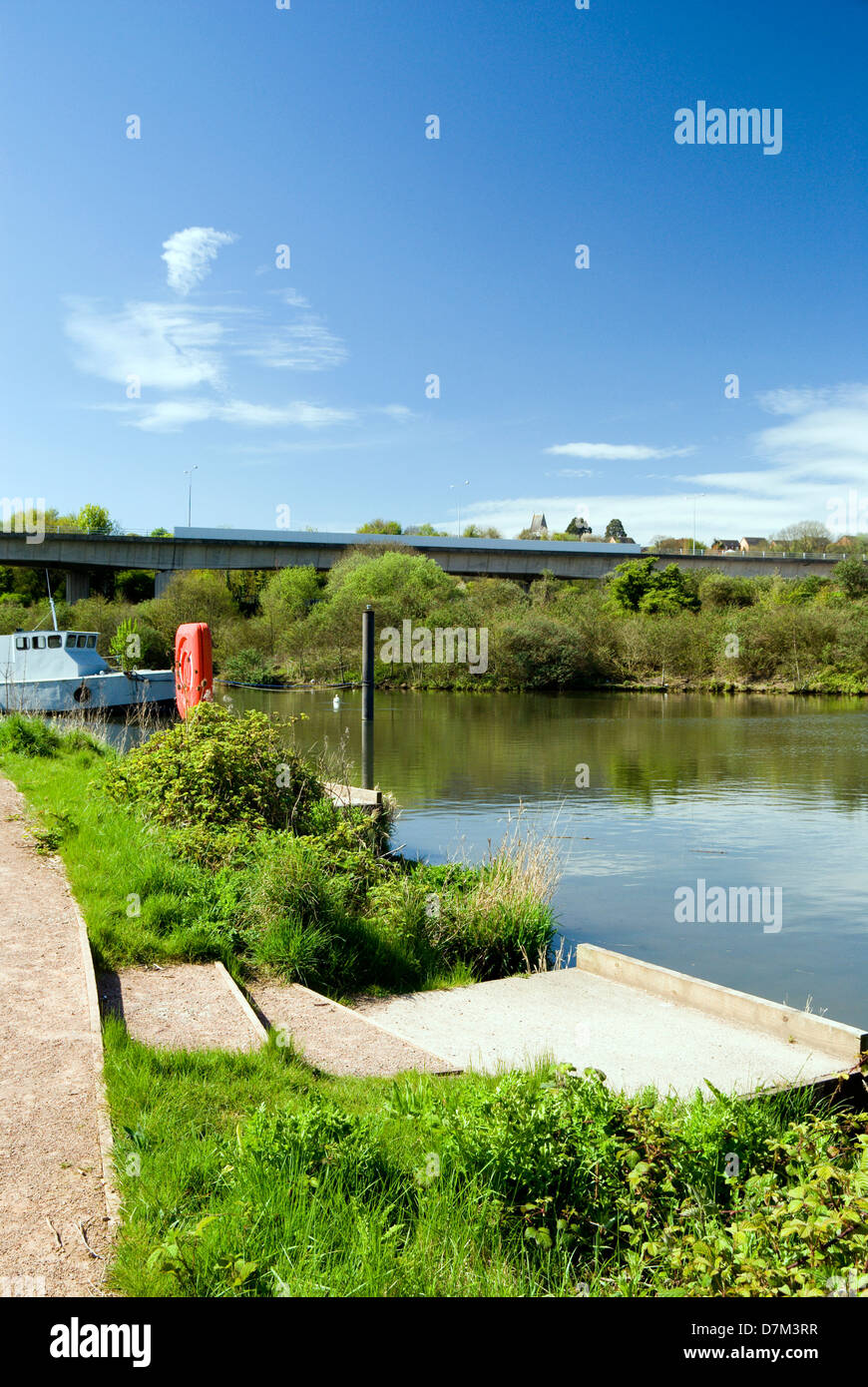 boats moored on river ely, besides ely trail, grangetown, cardiff, wales, uk. Stock Photo