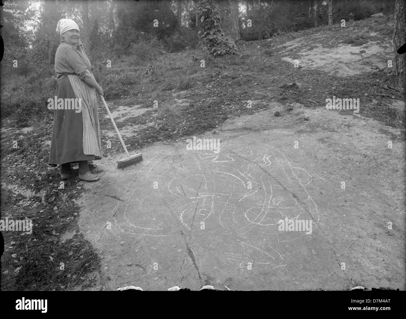 This image shows the process of sweeping a runic inscription in Viby ...