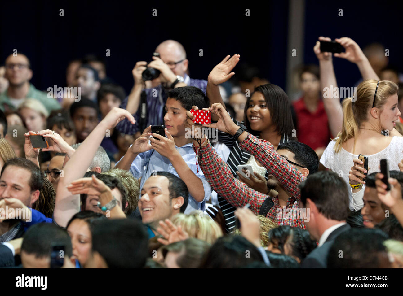 Students take photos as U.S. President Barack Obama speaks at Manor New Technology High School in Manor, Texas Stock Photo