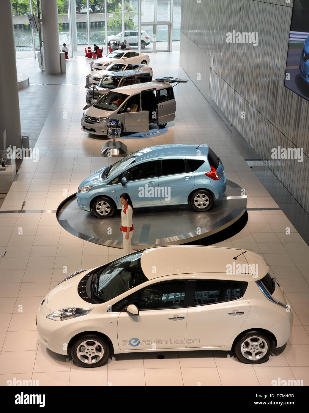 May 10, 2013, Yokohama, Japan - Visitors browse around at the spacious showroom of Nisan Motor Co.'s head office in Yokohama, south of Tokyo, on Friday, May 10, 2013. Nissan reported the slowest annual profit growth among Japanese automakers as a Sino-Japanese political dispute backfired, hitting Japan's No. 2 automaker hard when Chinese consumer began to boycott Japanese products in September last year.  (Photo by Natsuki Sakai/AFLO) Stock Photo