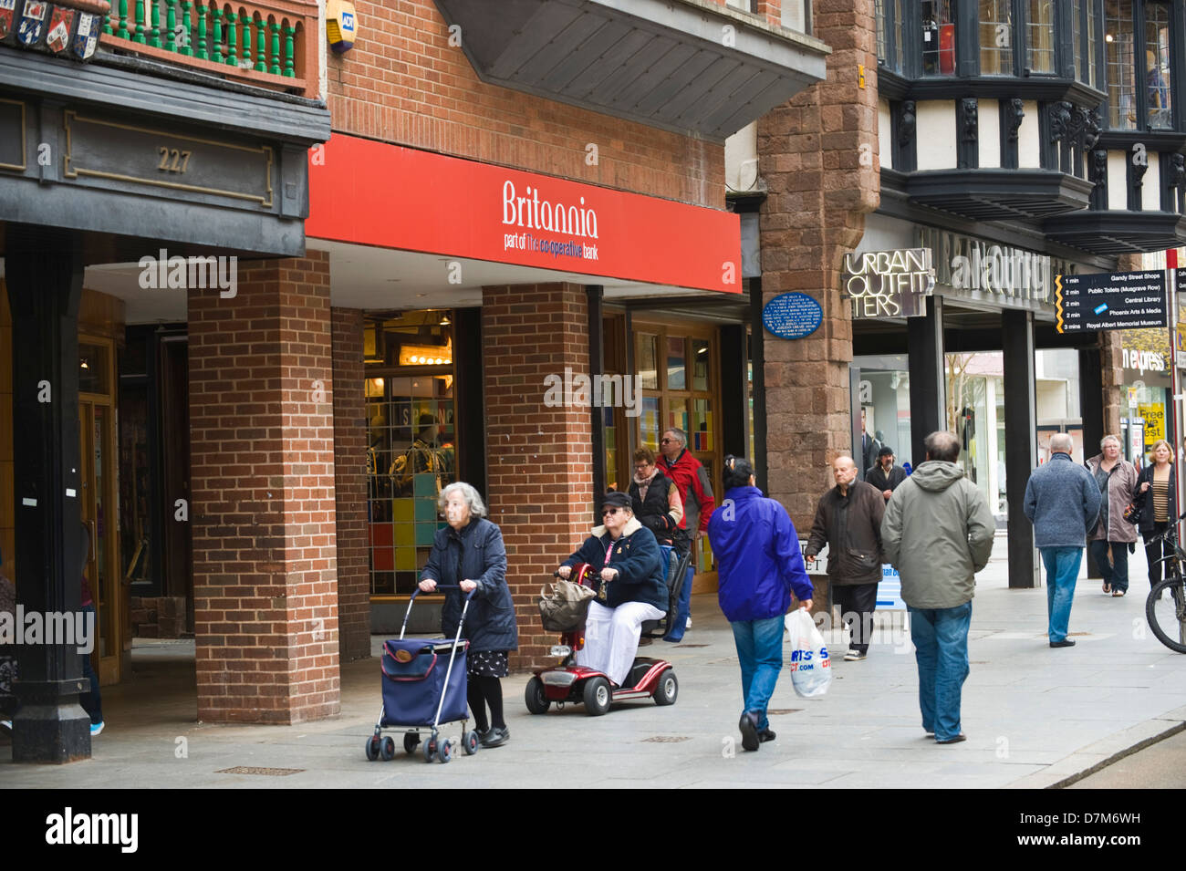 Shoppers on busy high street in Exeter Devon England UK Stock Photo - Alamy