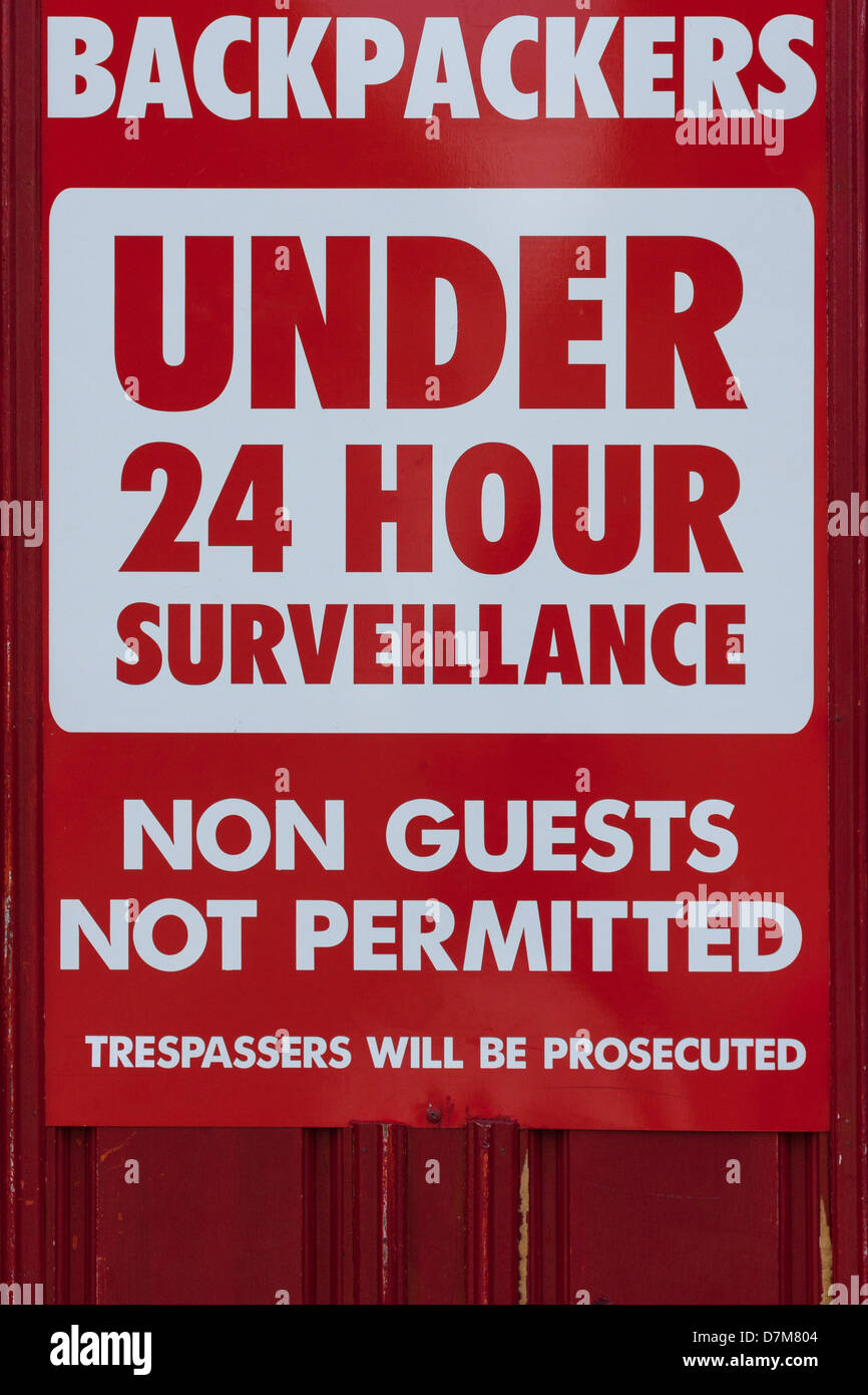 Backpackers 24 hour surveillance warning sign Stock Photo
