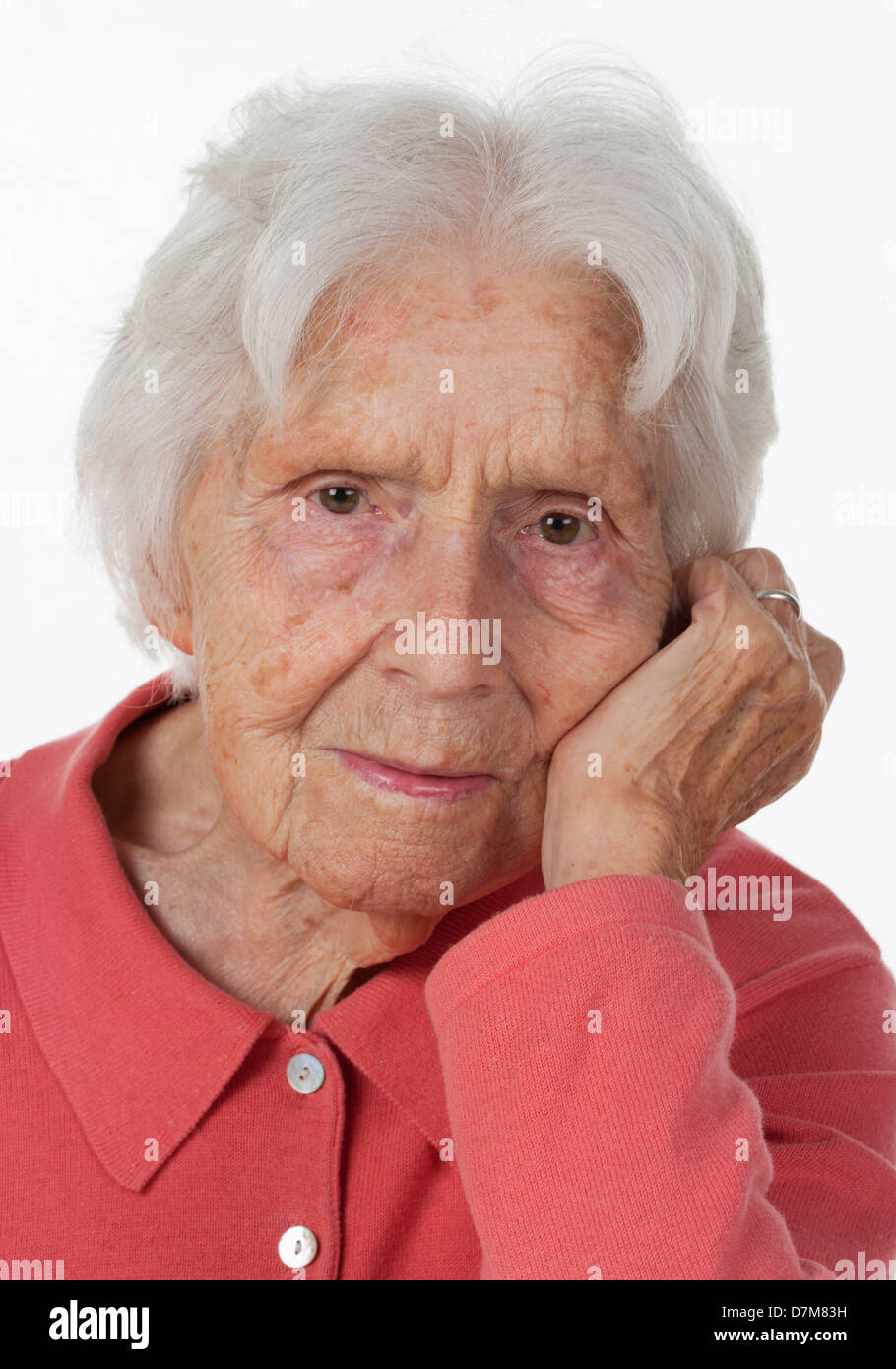Portrait of senior woman against white background, close up Stock Photo
